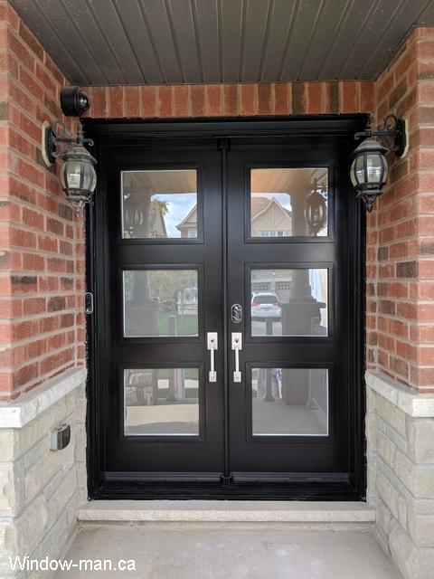 Double black front exterior doors. Contemporary trendy shaker style door. Three lite Acid etched glass. Narrow 29 inches each. Dorothy retro collection shaker style